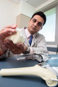 Ravi Bashyal studying knee bone